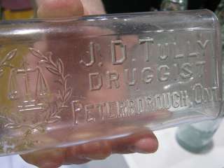 JD Tully druggist bottle from Peterborough Ontario