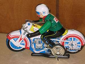 VINTAGE WIND UP TIN TOY MOTORCYCLE MS 702  
