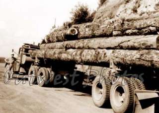 Photo of Old Vintage Log Logger Logging Truck & Driver  
