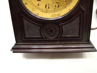nice vintage cathedral style shelf or mantle clock. In overall very 