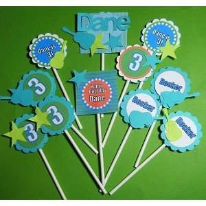   Cupcake toppers, set of twelve Rocks star guitar design: Toys & Games