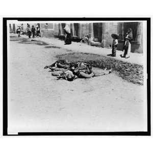   Bodies of dead men piled on a Mexican street,1913 1920