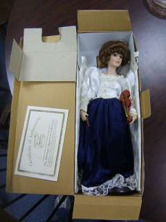 Heritage Signature Collection doll playing violin  