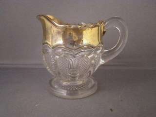 ANTIQUE GLASS FILE AND TEARDROP PATTERN CREAMER  