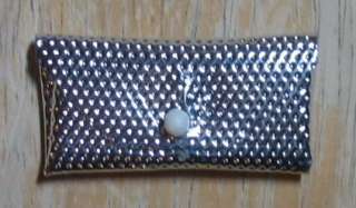 Up for bid is a silver dimple clutch bag purse for Barbie, Francie 