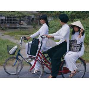  Girls Riding Bicycles, Ho Chi Minh City (Saigon), Vietnam 